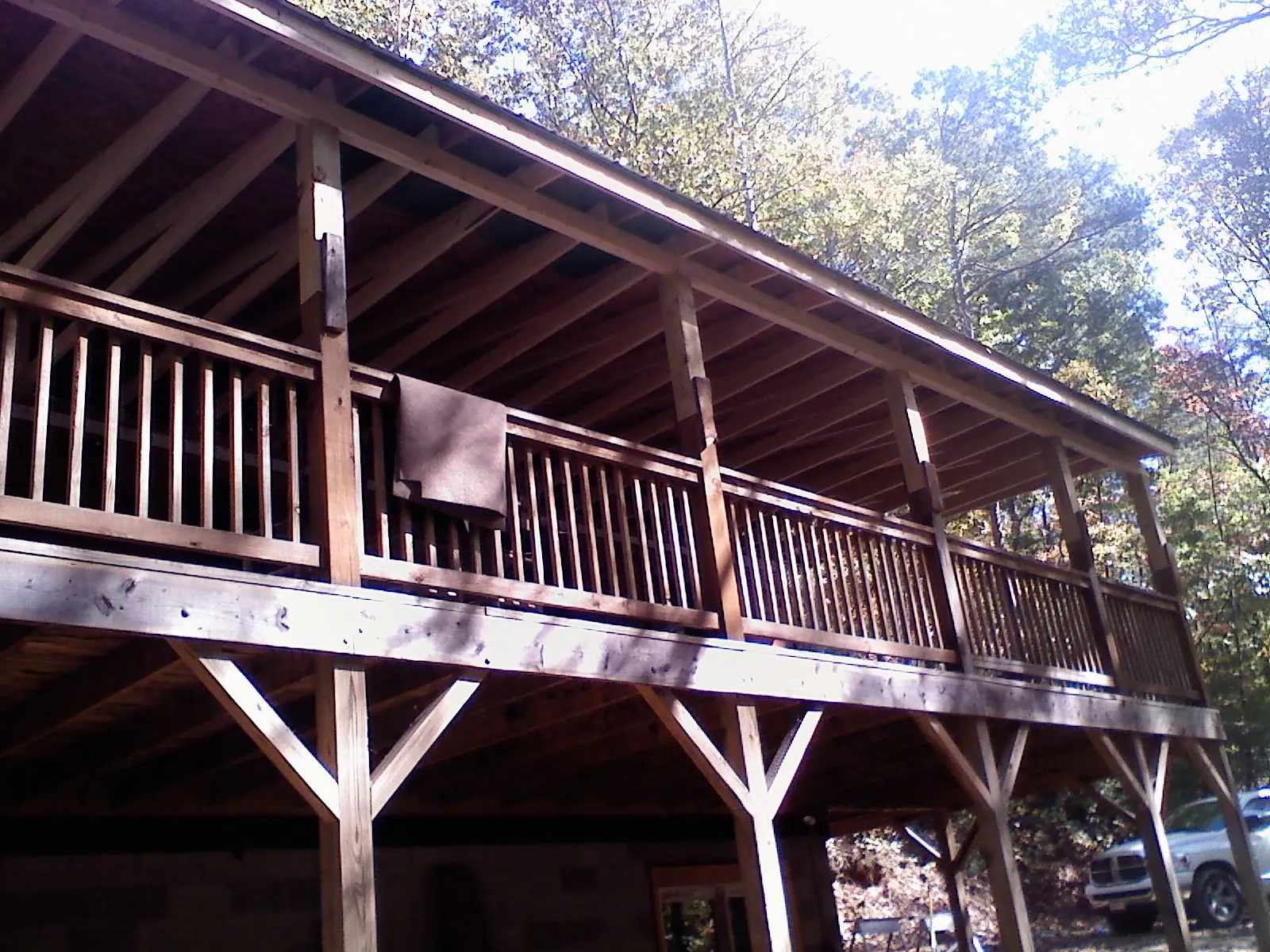Timber framing under a new elevated porch and deck — Roof Leak Repair in Windfall by Roofing Brothers